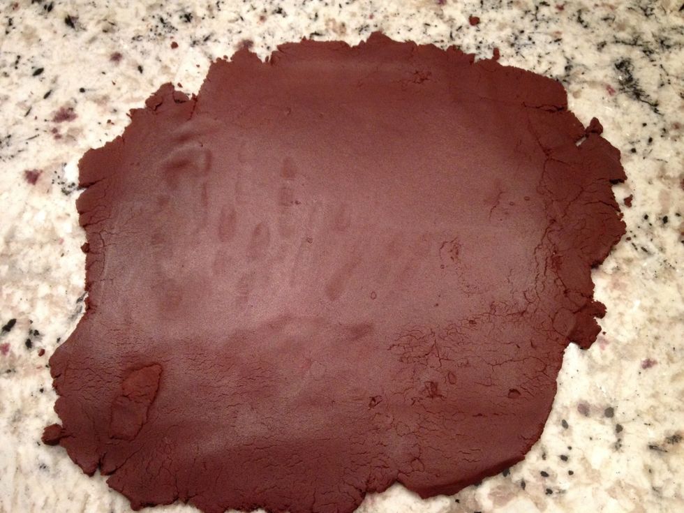 Roll out the cookie dough to about 1/4 of an inch.