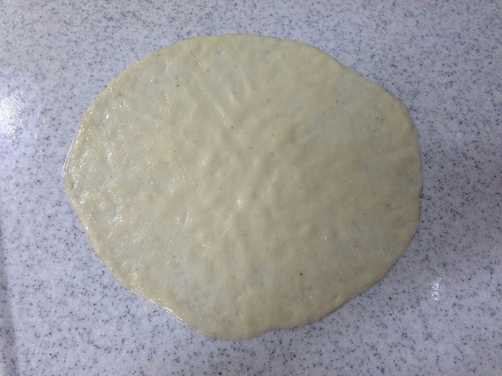 roll out the dough as a circle