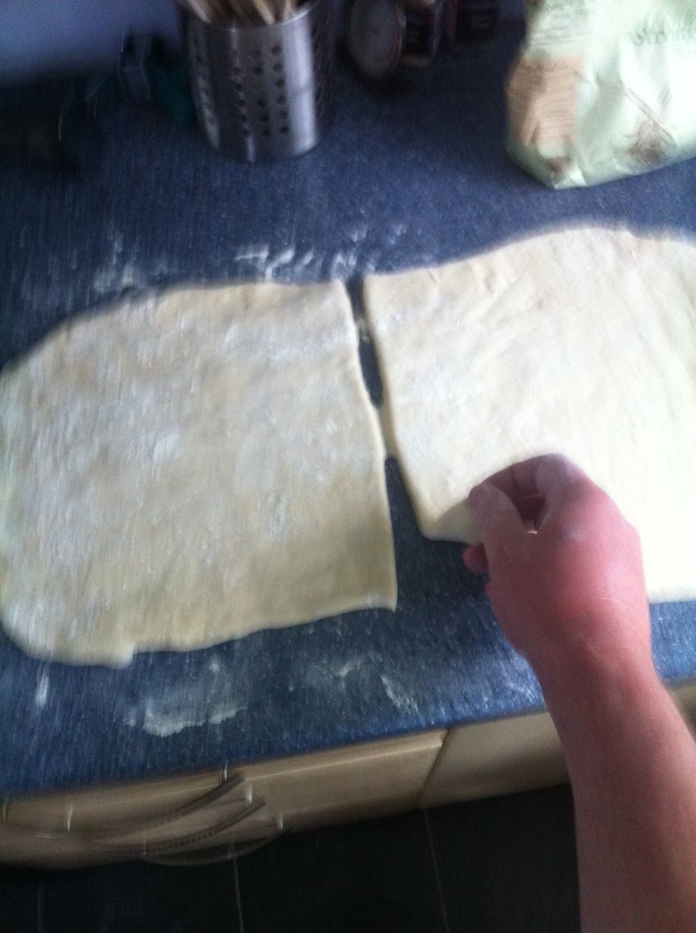 Roll out the dough on a floured surface.