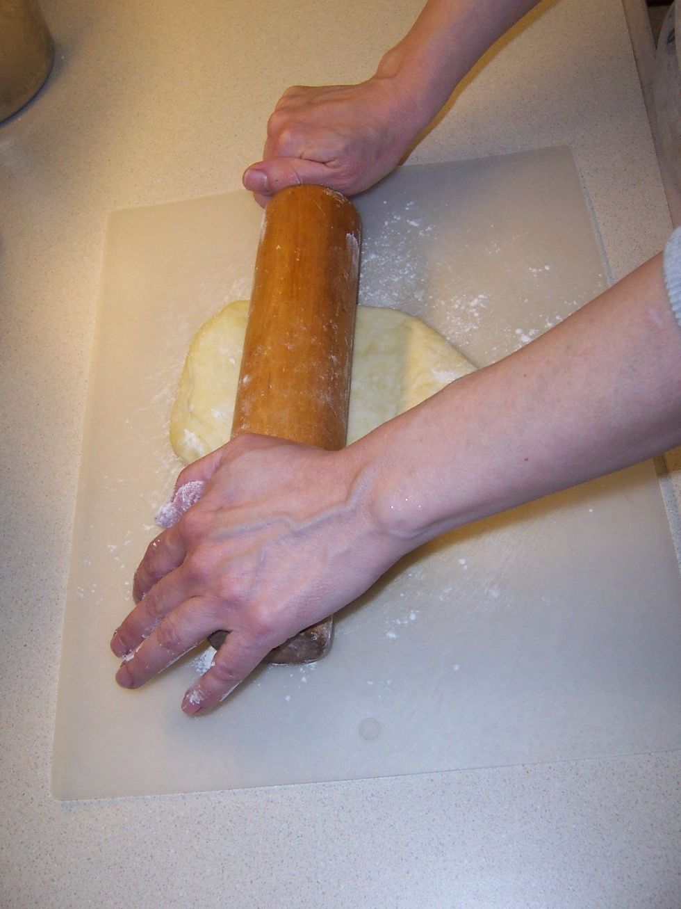 Roll out the dough to a twelve-inch circle. The remaining dough can be frozen for up to one month.