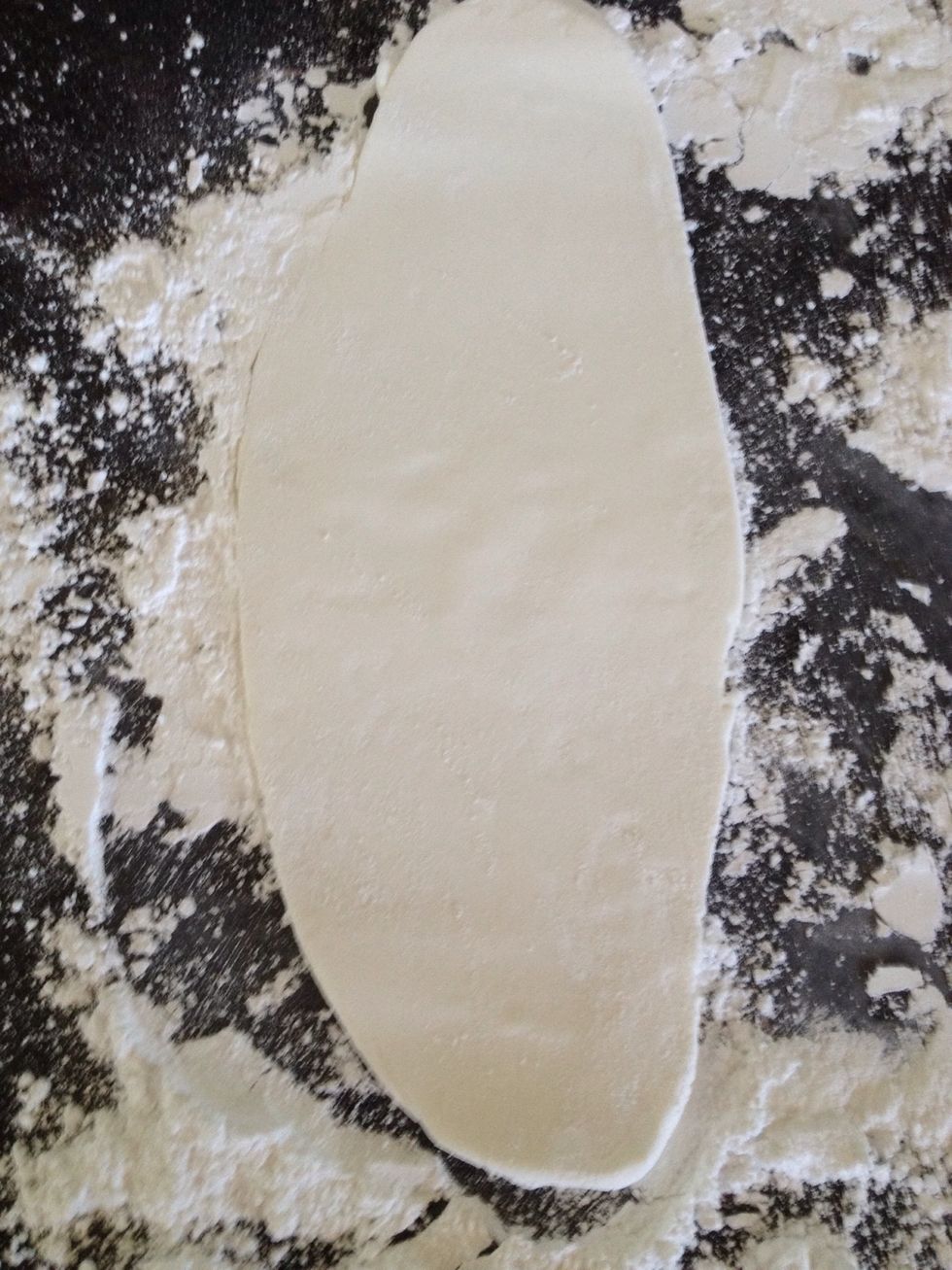 Roll out the fondant using a rolling pin.