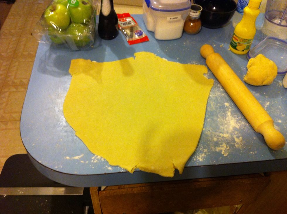 Roll out the larger pastry until relatively thin and make sure it will cover the whole pie tin. You will need to flour the bench otherwise when you take it off the bench the pastry may split.
