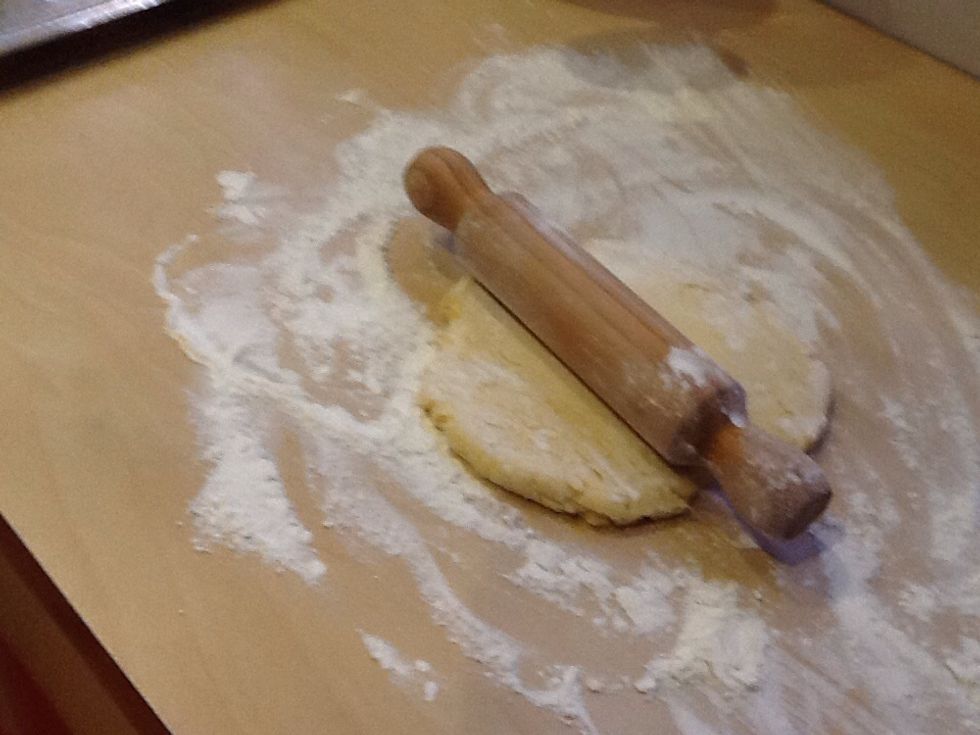 Roll out the pastry on a bed of flour.