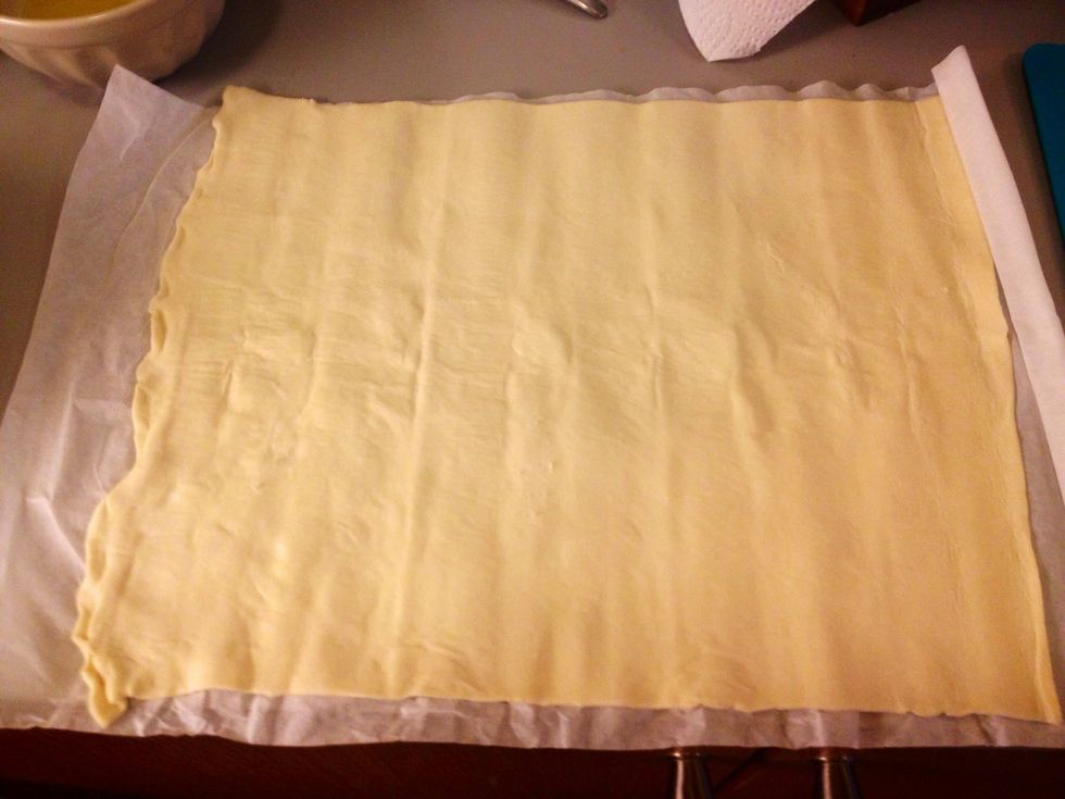 Roll out the puff pastry.