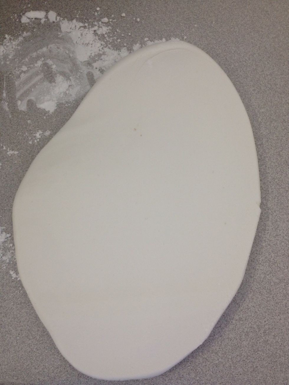 Roll out white fondant icing