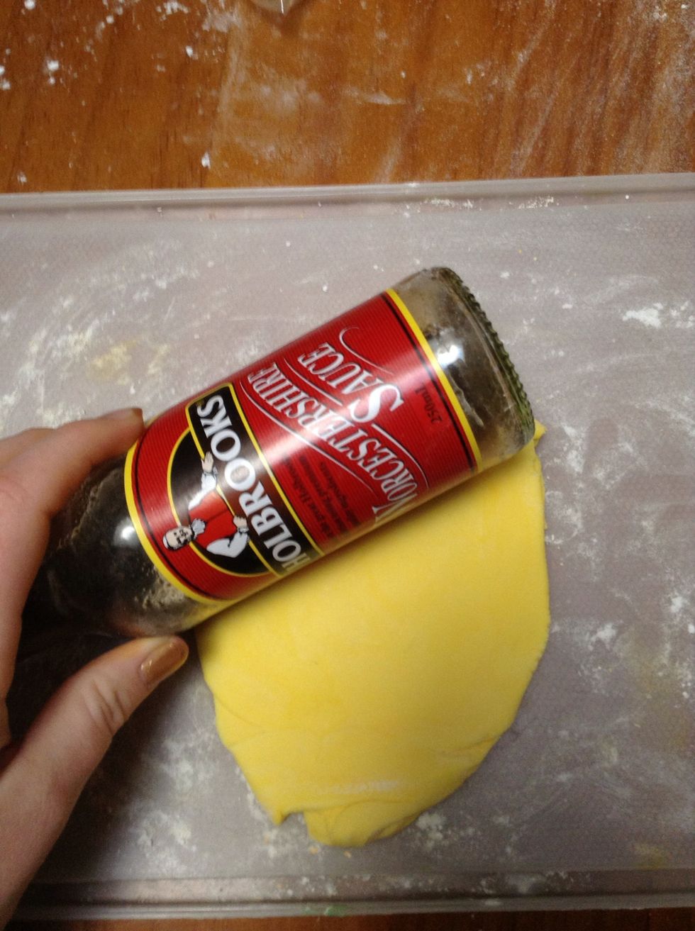 Roll out with a rolling pin (or sauce bottle) until less than half a cm thick