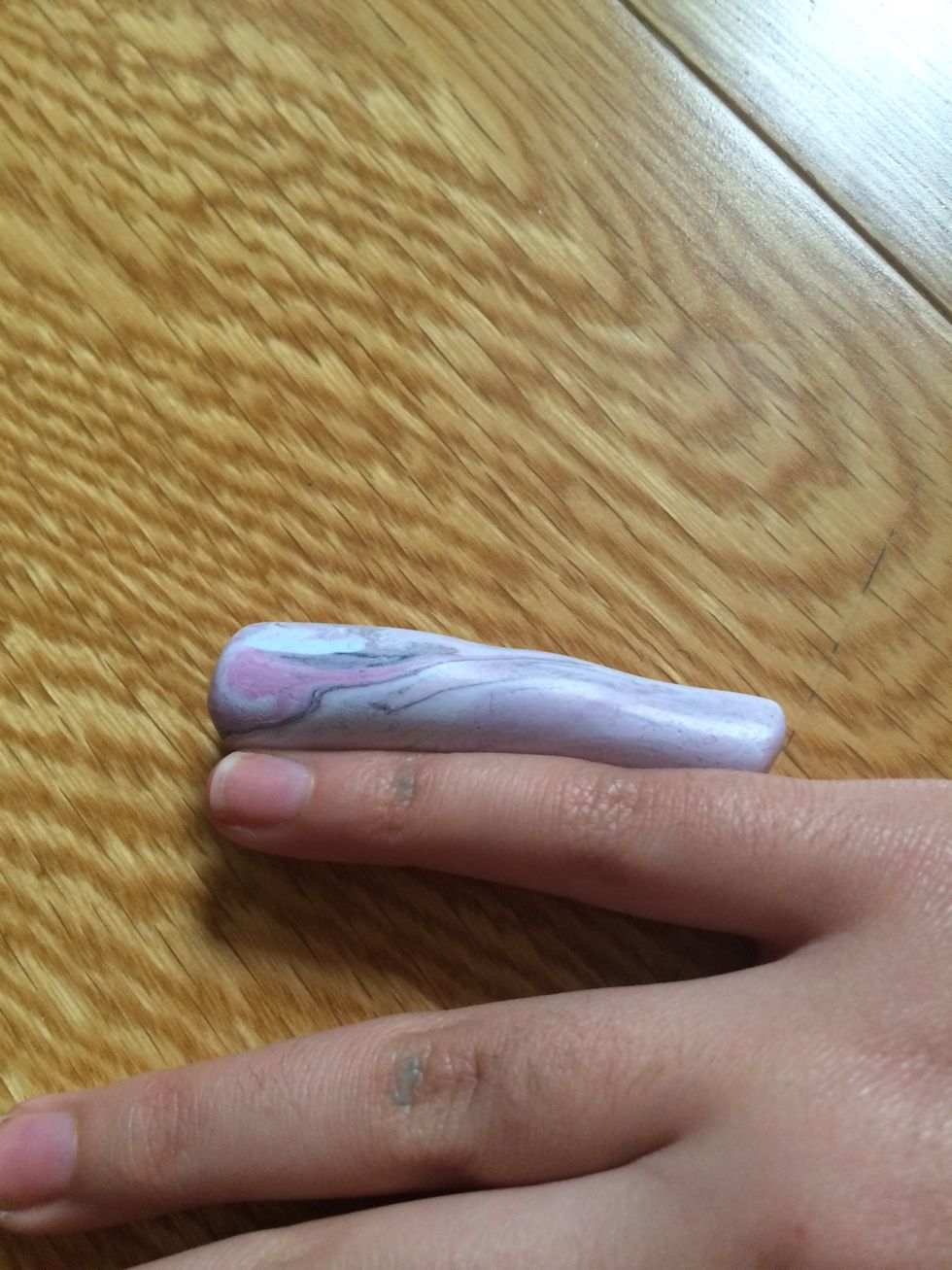 Roll out your clay so it's roughly the size of your pinkie