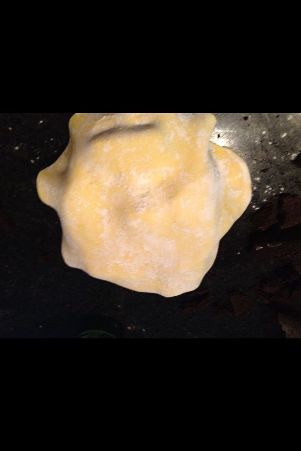 Roll out your color fondant and lay over your cake