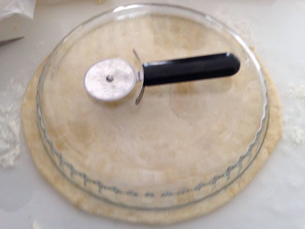 Roll out your dough and place your dish over the top. Cut around the dish leaving a cm or so. TIP: use a pizza cutter it so much easier :)