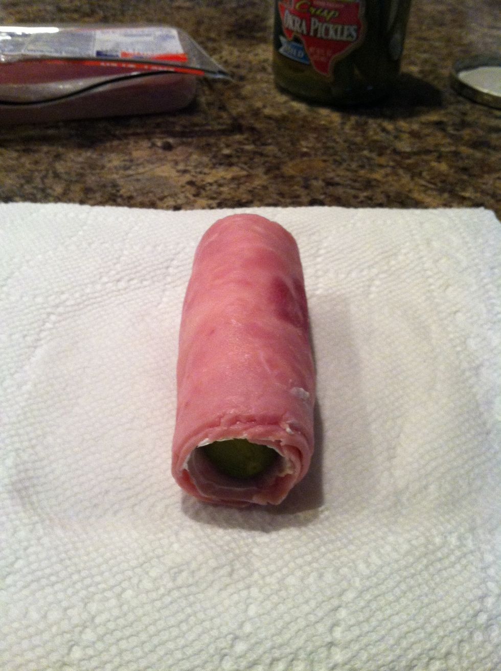Roll pickles into ham & cream cheese.