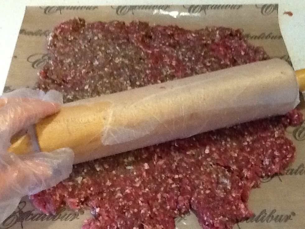 Roll plastic wrap around your rolling pin. Roll beef to your shelf size.