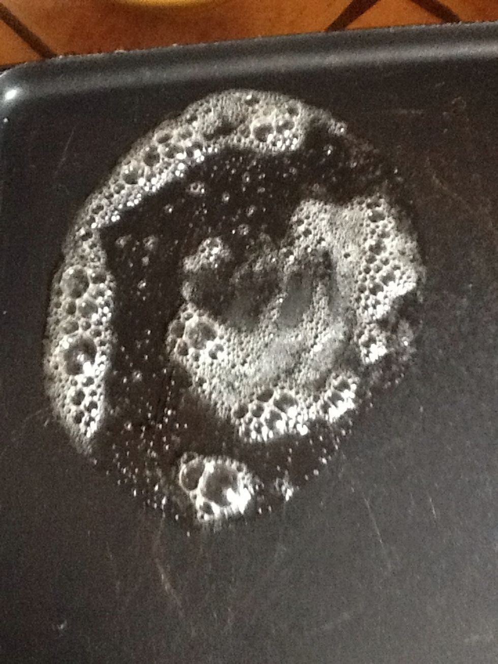 Roll some butter on the spot where you want to cook a pancake.