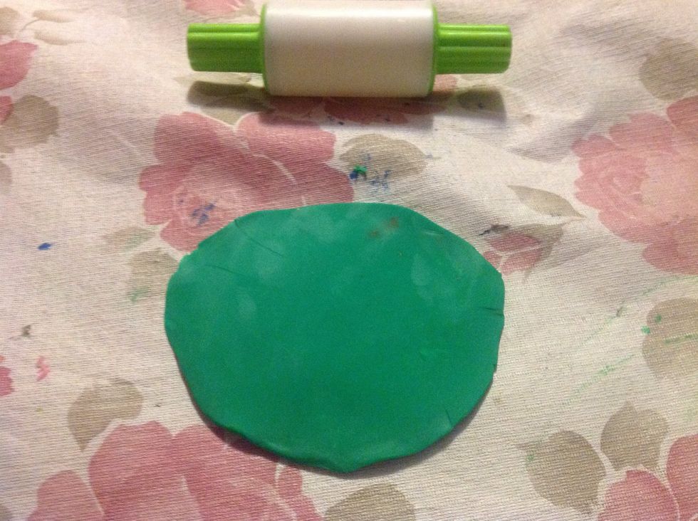 Roll that part to make it a little bit like an oval .
