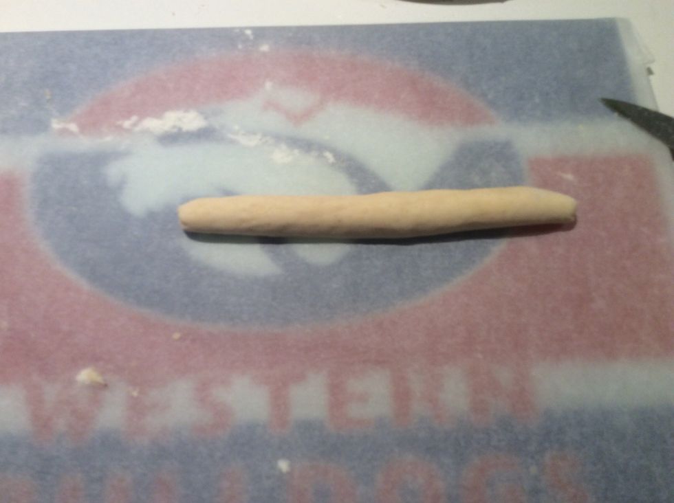 Roll the 8 portions into 2cm wide sausages