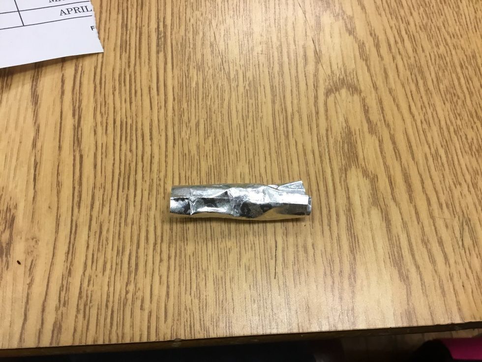 Roll the ball in the wrapper