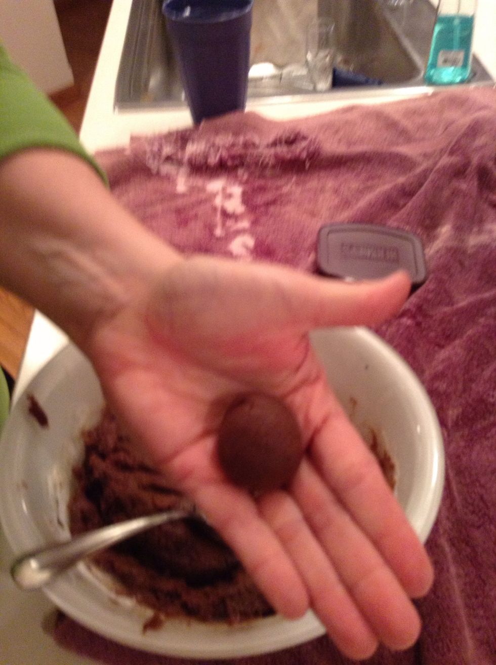 Roll the ball into a one inch diameter or however big you want it