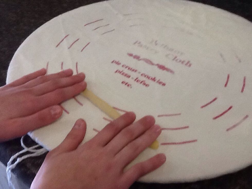 Roll the ball into rope the thickness of a pencil