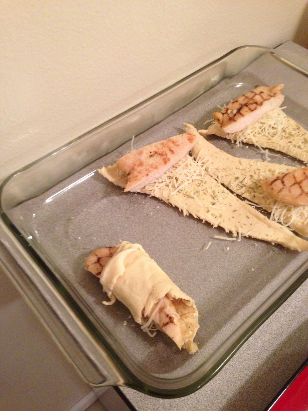 Roll the chicken inside the crescent roll. Complete this for all of the crescent rolls.