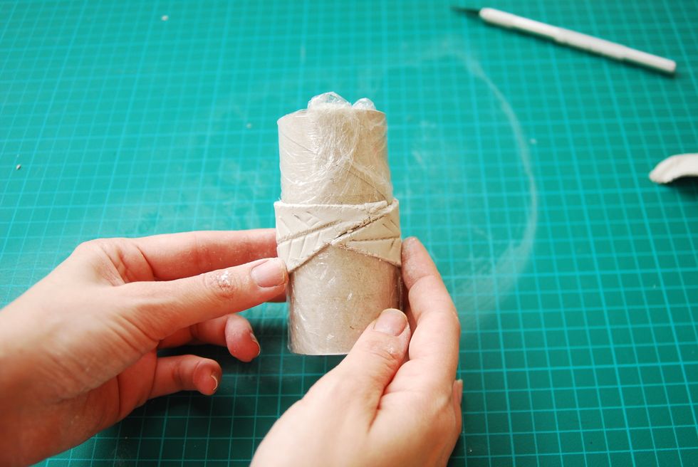 Roll the clay form around the cylinder and left to dry overnight.