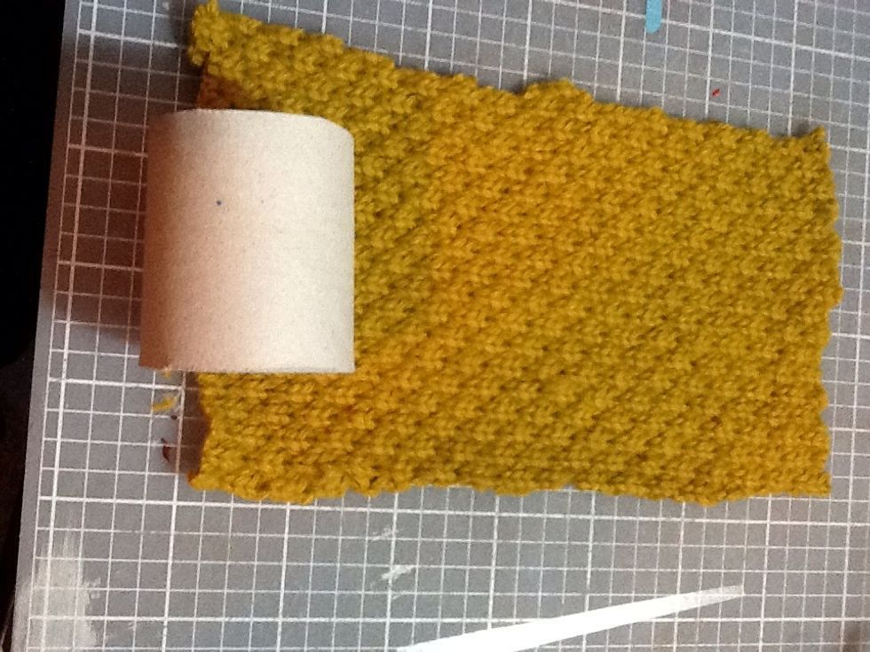 Roll the core onto the fabric.