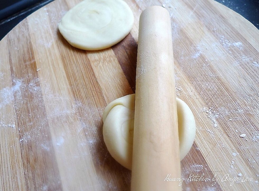 Roll the cut portion of each prepared dough flat with a rolling pin.