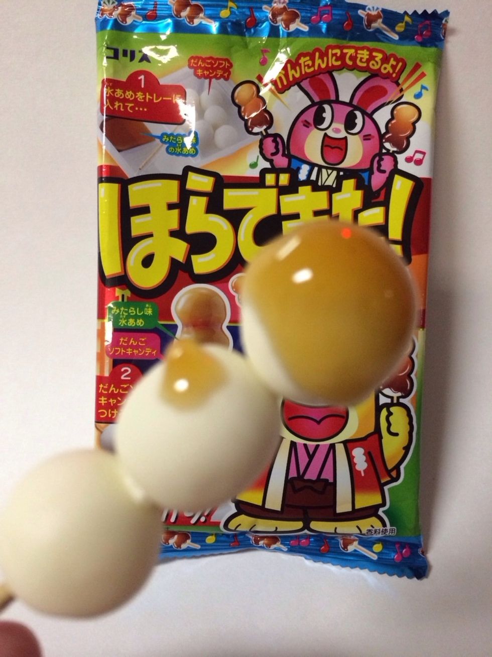 Roll the Dango in the soy sauce