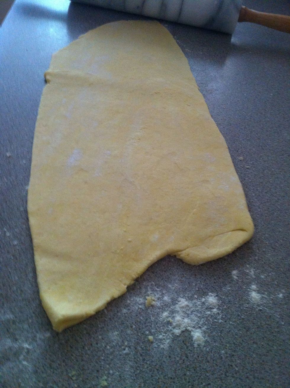 Roll the dough away from you (not back and forth), forming a long rectangle (about 8\u00d720 inches). Try to keep the edges straight