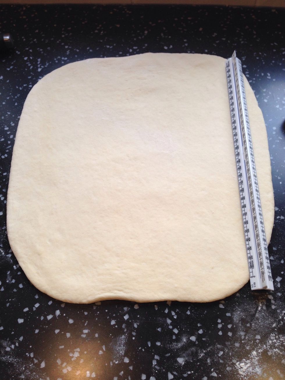 Roll the dough disc into a 26x26cm square. Try to get an even thickness