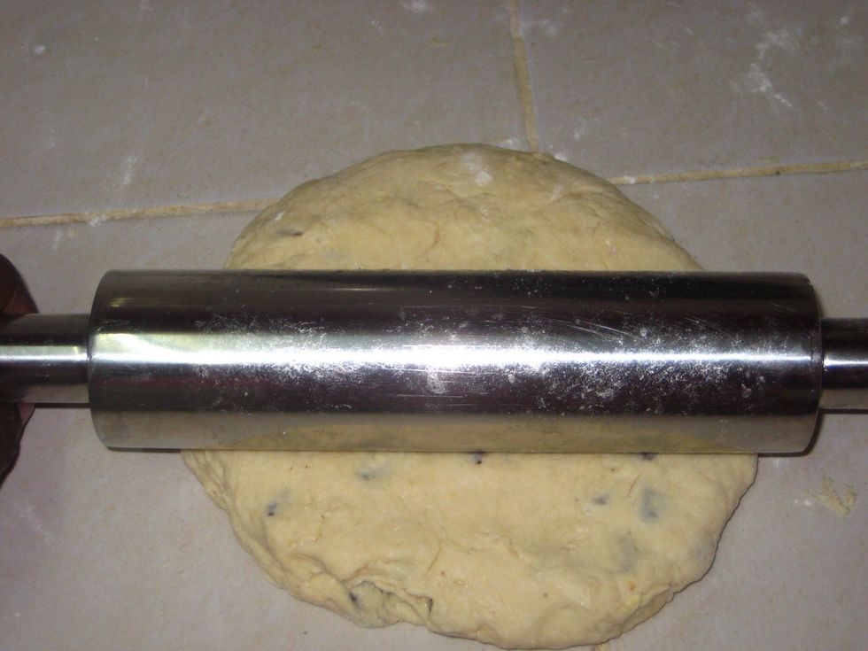 Roll the dough into a round 1 inch thick circle. You can also make it 1/2 inch for smaller scones