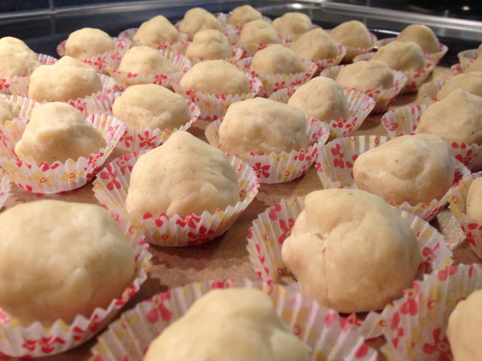 Roll the dough into little balls. Place onto cookie sheet. My batch made around 40 cookies.
