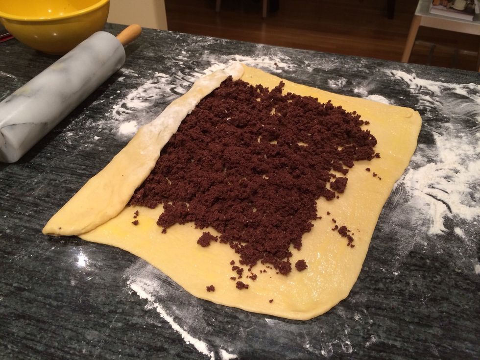 Roll the dough up tightly like a jelly roll.