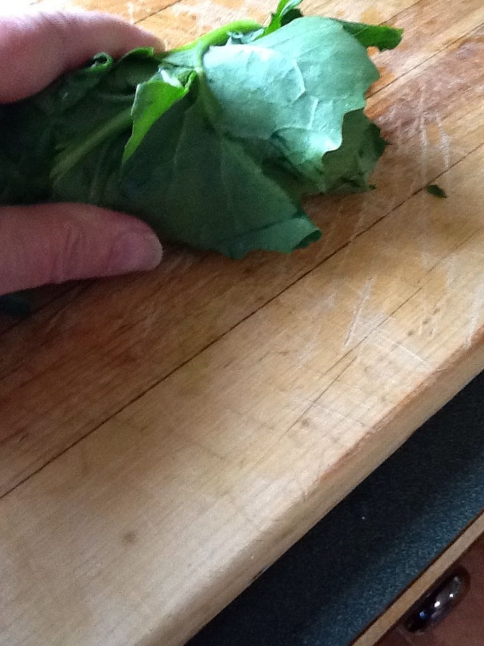 Roll the kale leaves all together