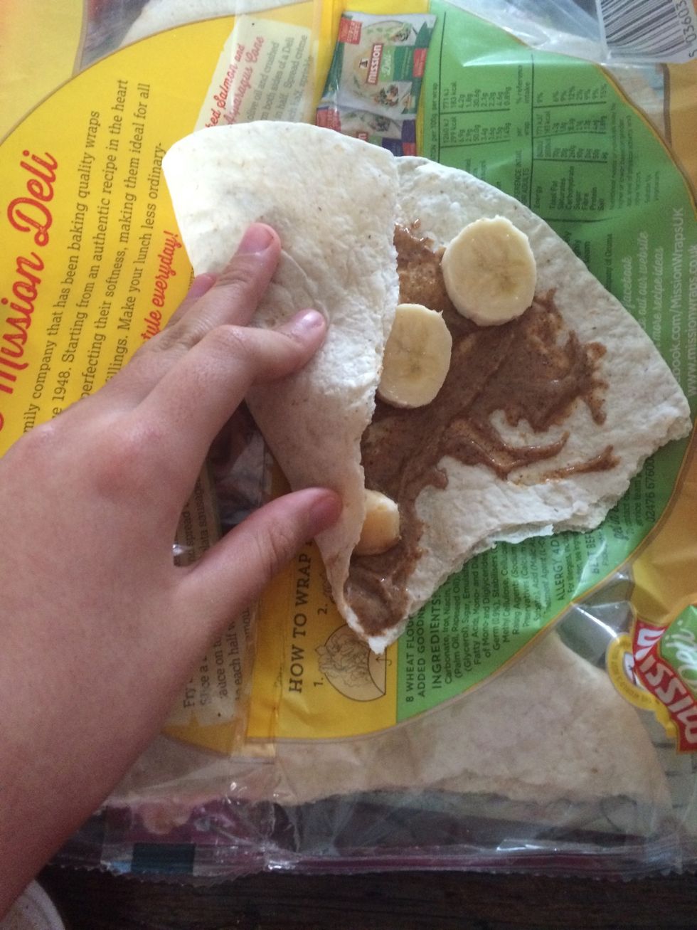 Roll the left side to the the middle, at this step i finished eating mine!