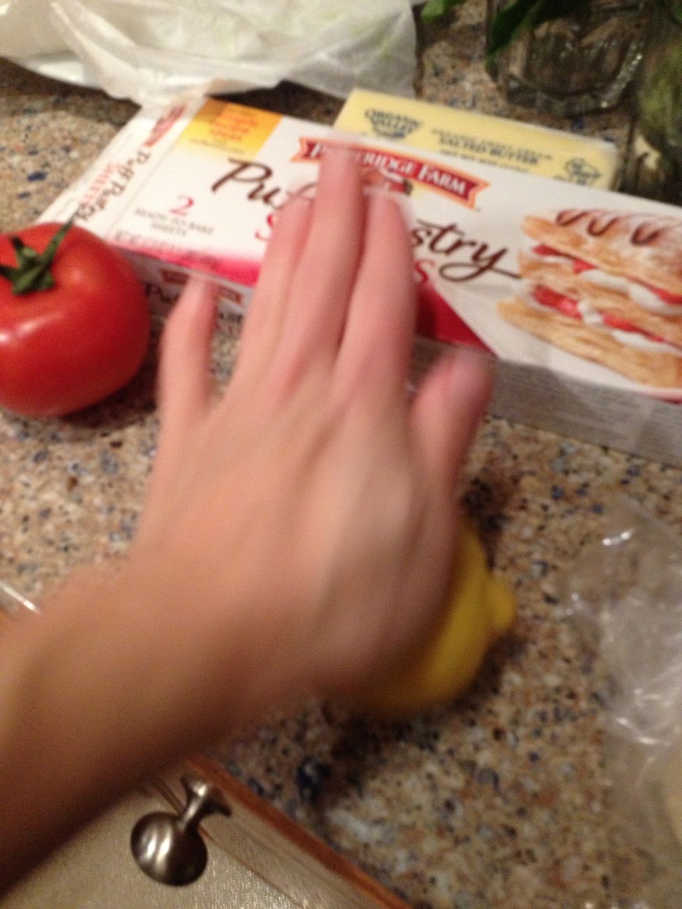 Roll the lemon to get the juices ready...