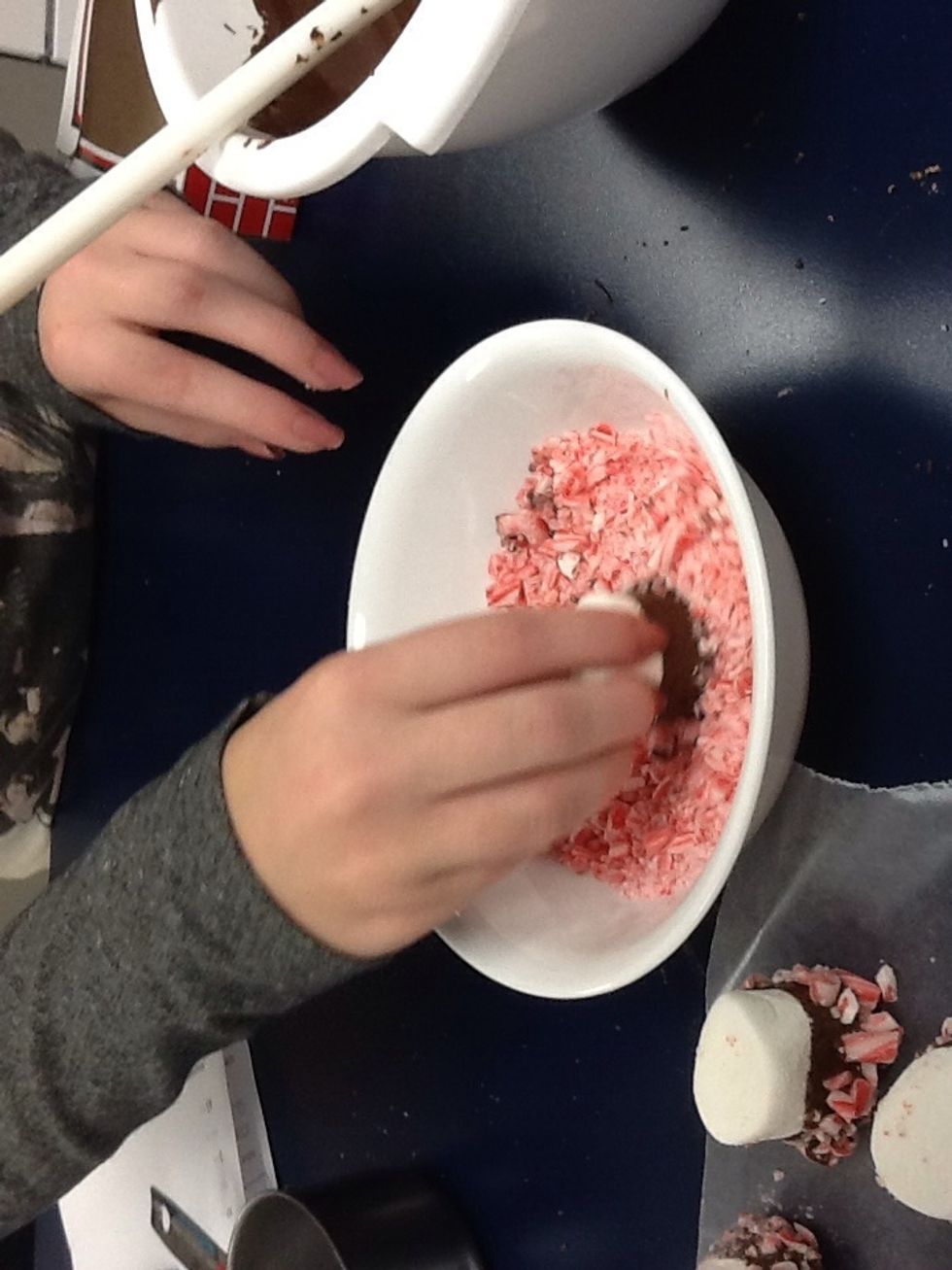 roll the mallows in the candy cane bits