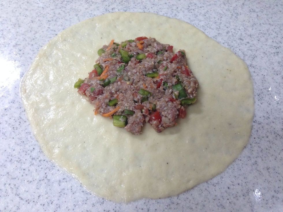 Roll the meat ball as a circle