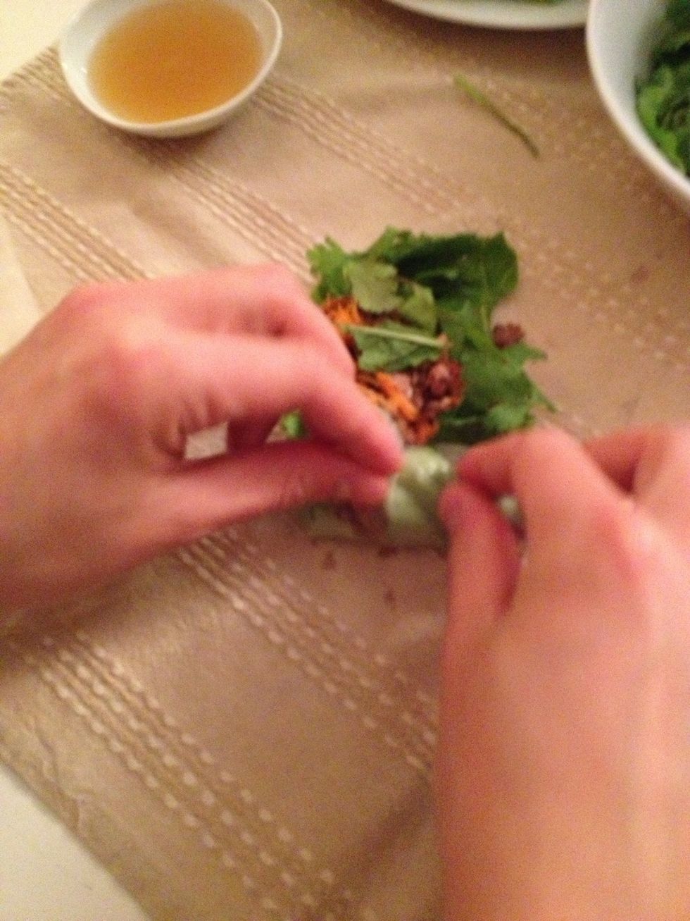 Roll the Nem tightly together.