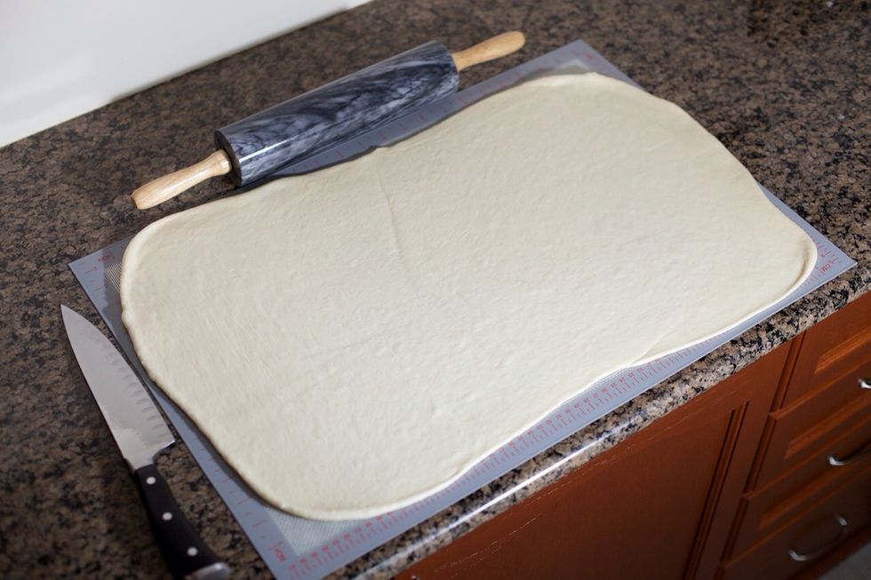 Roll the other half of the dough into a large rectangle.  Roll it out about 5-10 mm thick.
