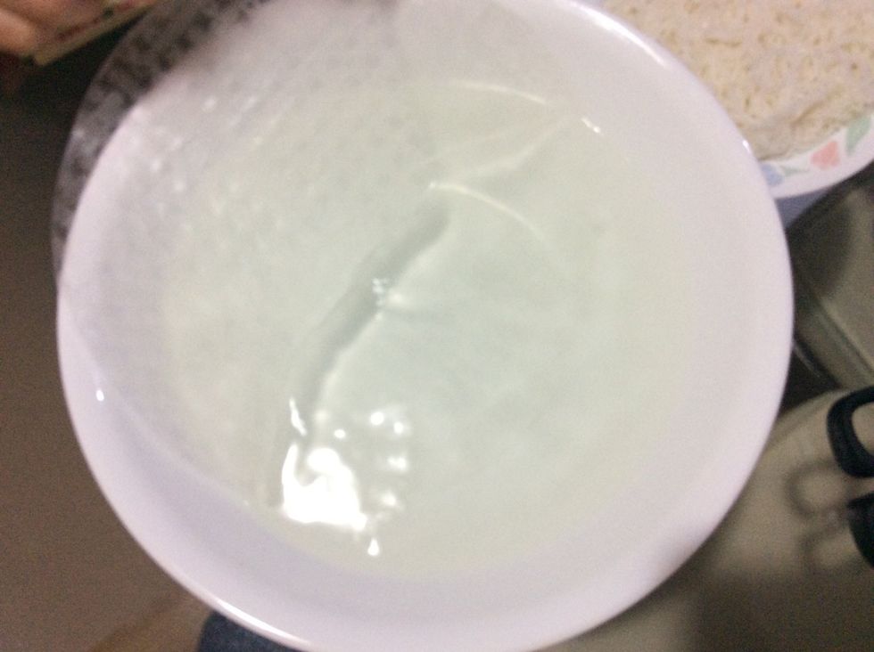 Roll the rice paper in the bowl of water until all of its surface is wet.