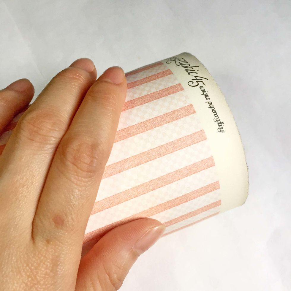 Roll the roll using your palm to ensure the pattern paper is well adhered onto the surface.