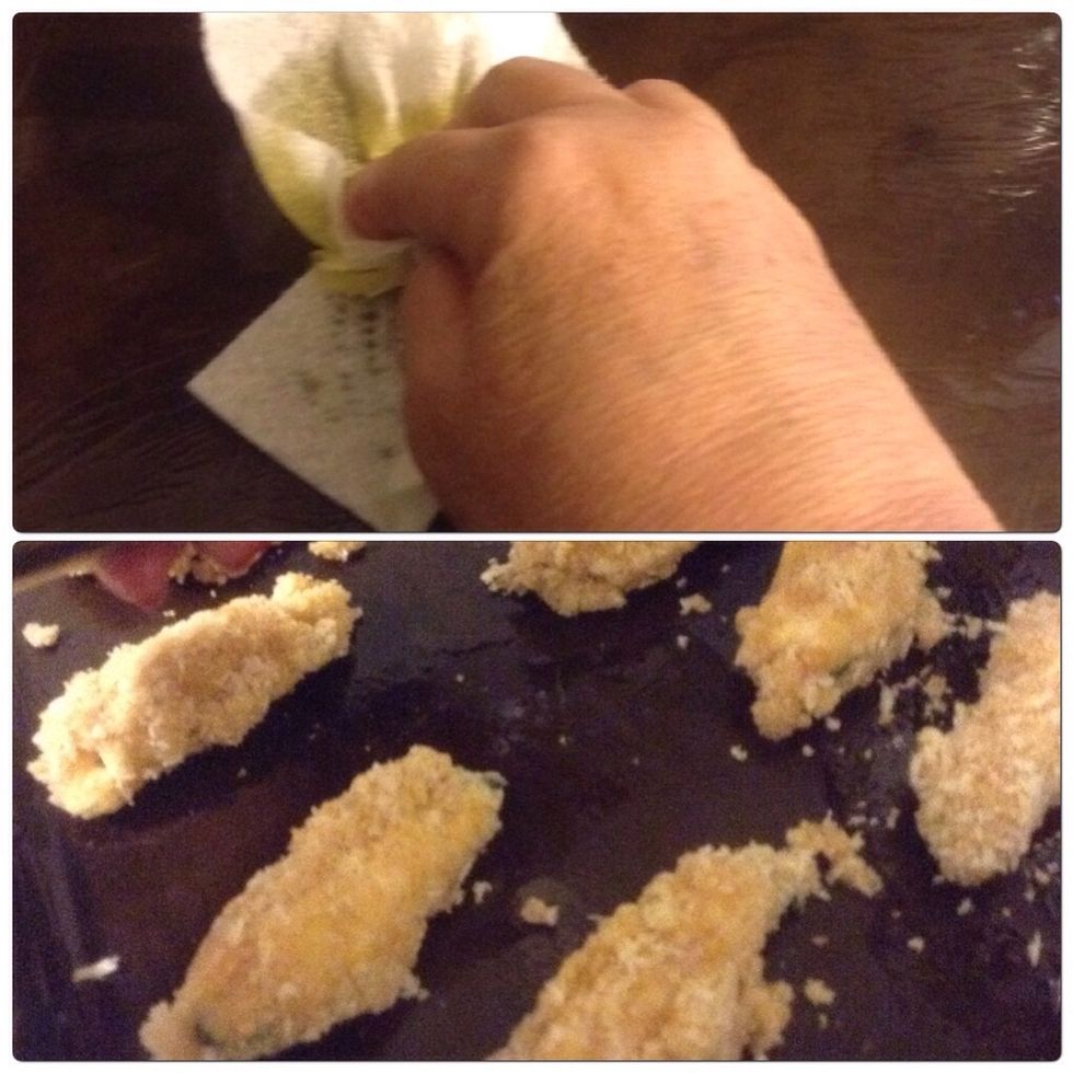 Roll the stuffed jalape\u00f1os in the egg mixture and then the bread crumb mixture (Couldn't take a photo because my hands were a mess!) Place on a cookie sheet that's lightly greased with olive oil.