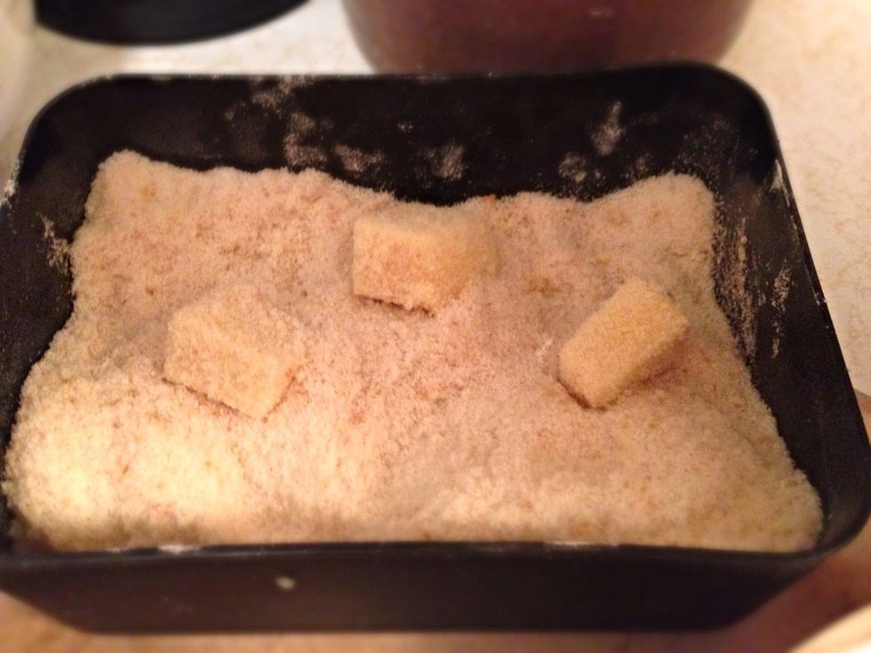 Roll them around to get them evenly covered. I like to repeat egg and crumbs again (not flour, it's only for the egg to bond with the cheese) cause it likes to leak in the fryer!