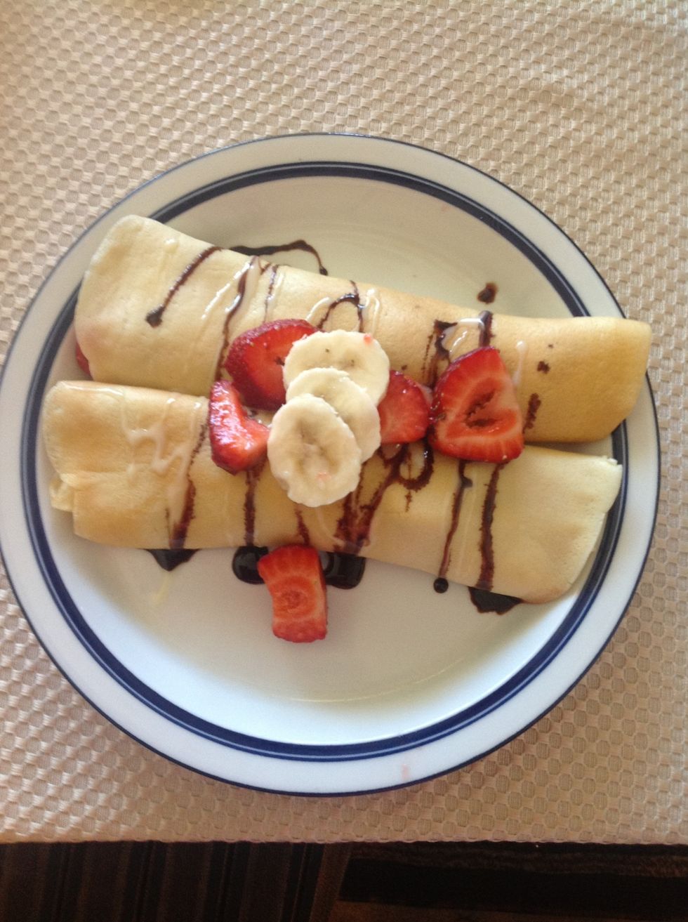 Roll them up and top with chocolate, strawberries, and bananas!