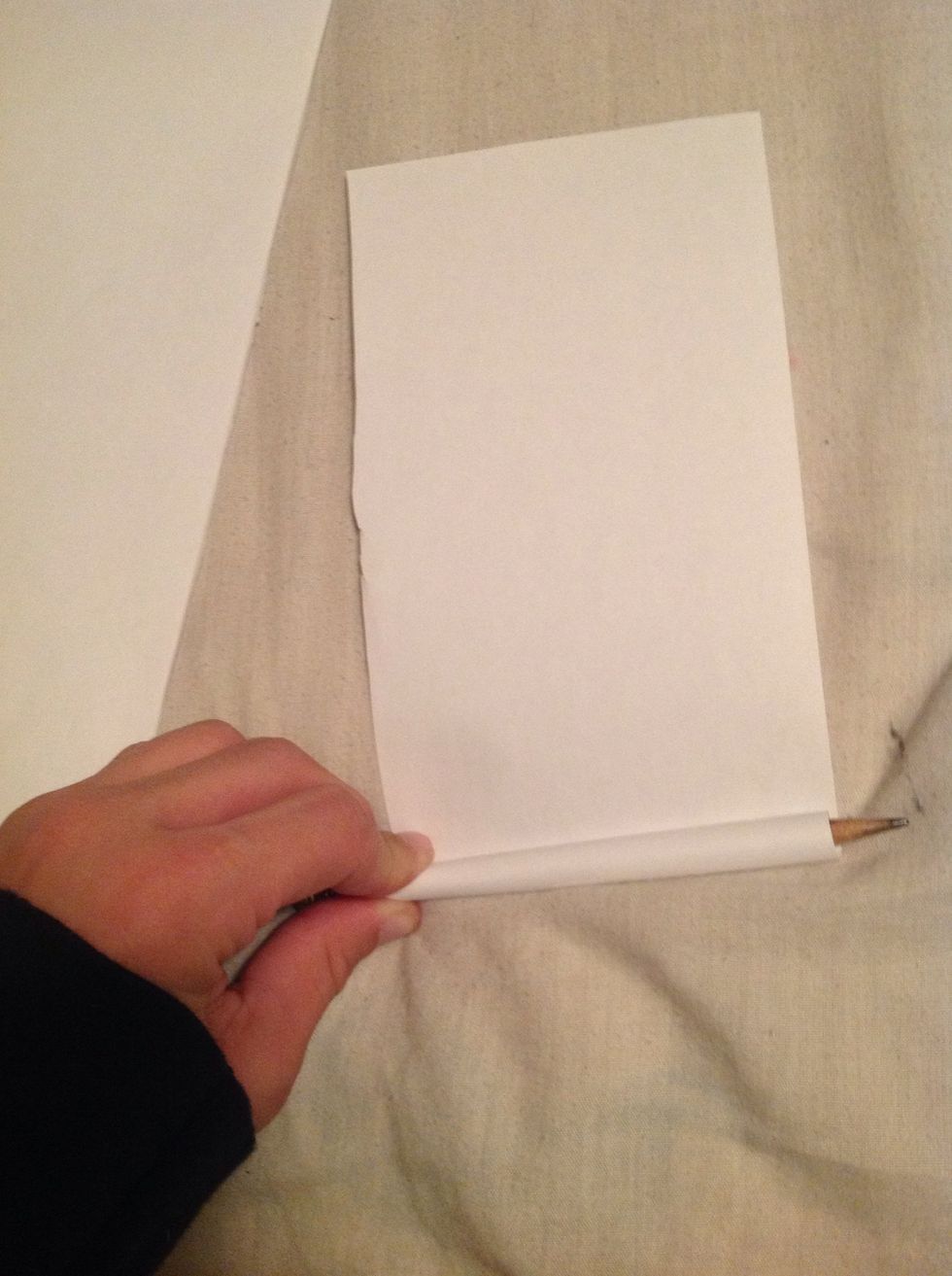 Roll them up with a pencil and tape it so it doesn't unroll.