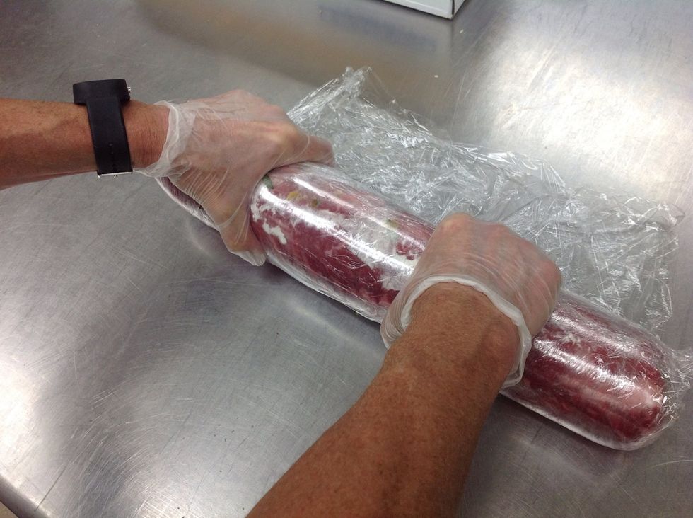 Roll tightly in multiple layers of plastic wrap