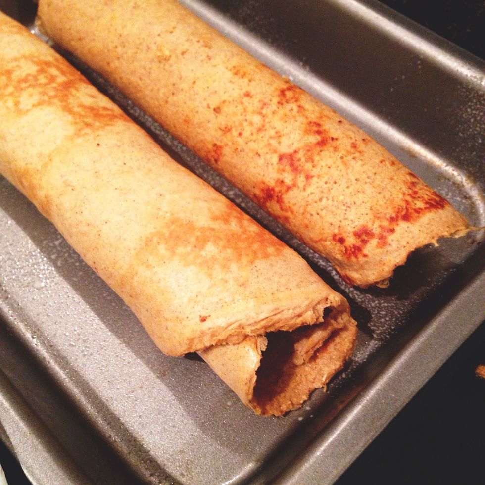Roll up and put in a baking tray with fry light.