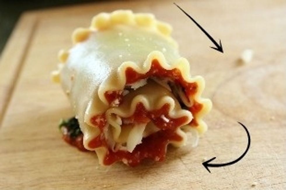 Roll up each lasagna noodle, loosely.