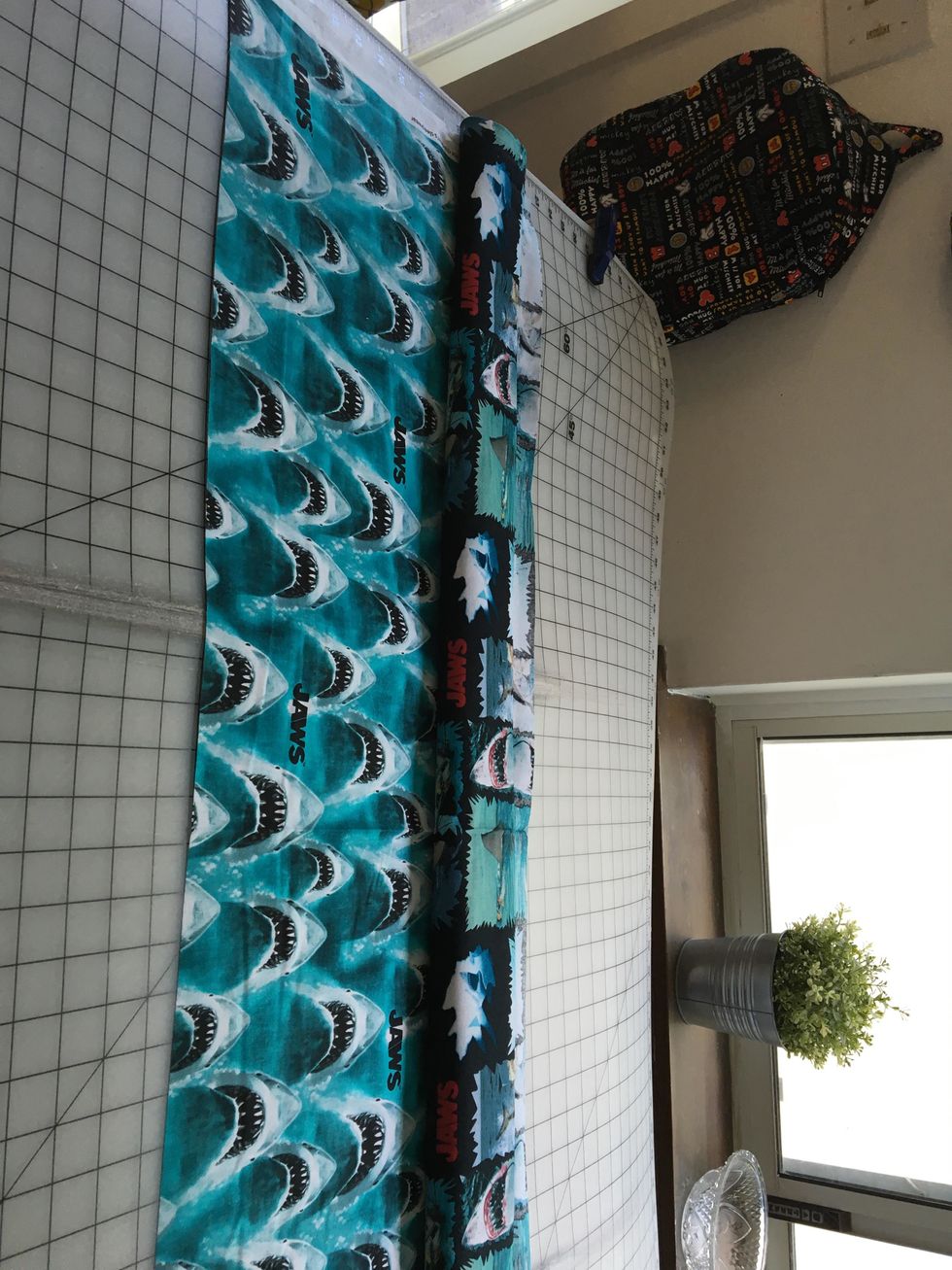 Roll up the bottom edge of the main body fabric, keeping the top edges matched together.