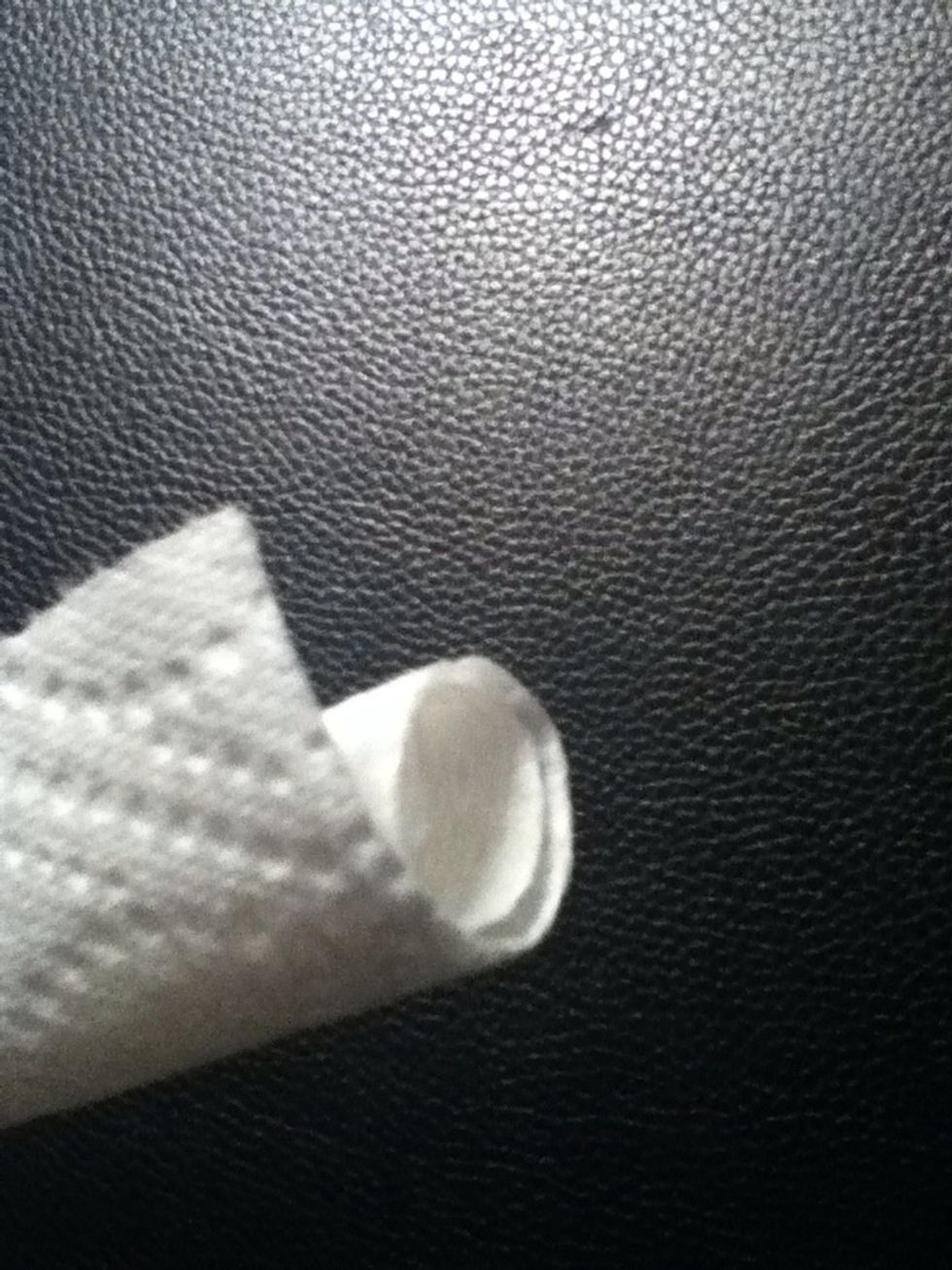 Roll up the paper towel lengthwise. Easy enough.