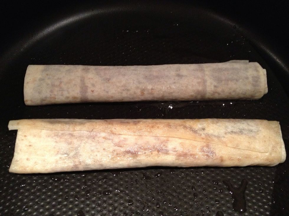 Roll up the wrap (the sliced banana creates an easy fold point that guides you), and place seam-side down in the pan; after a few minutes turn over. The seam is sealed and the wrap slightly golden.